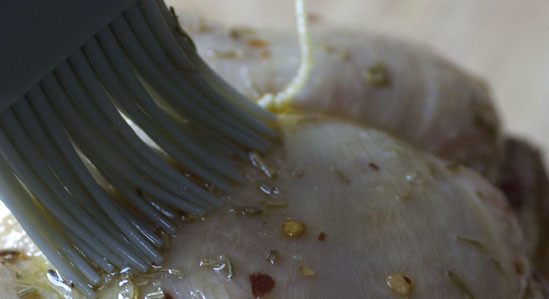 Galletto aromatico con patate al forno