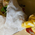Grilled chicken wrap with grated swiss cheese