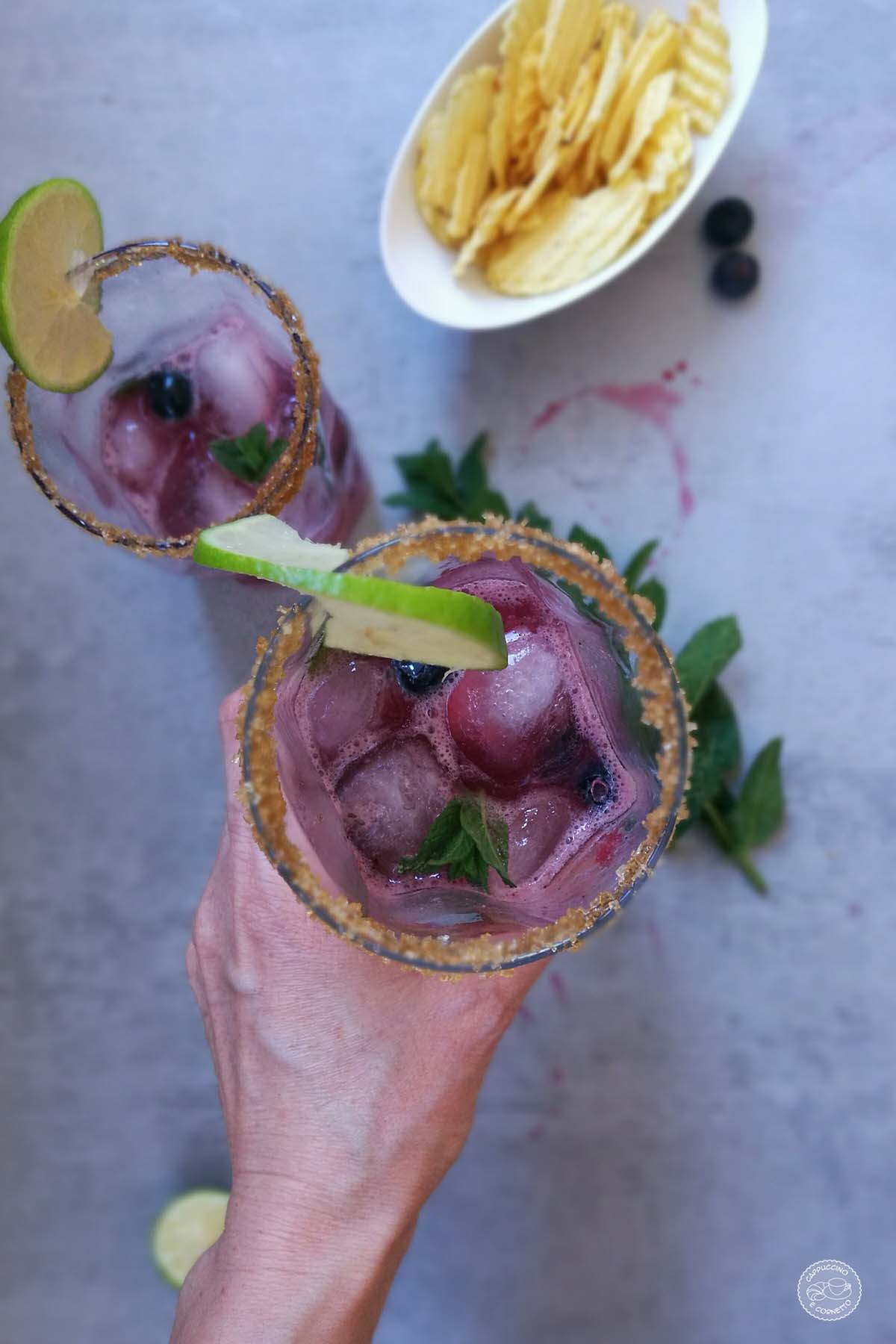 Drink a base di ginger beer, estratto di mirtilli e sciroppo d'acero.